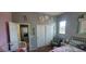 Bright bedroom features soft grey walls, white trim, and playful decor for a cheerful ambiance at 20838 E Vía De Arboles --, Queen Creek, AZ 85142