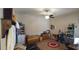 Cozy bedroom with ceiling fan, neutral walls, and personal touches for comfortable living at 20838 E Vía De Arboles --, Queen Creek, AZ 85142