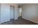 Bedroom with carpet and open closet at 22320 W Morning Glory St, Buckeye, AZ 85326