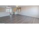 Spacious bonus room with wood-look flooring and ample natural light at 22320 W Morning Glory St, Buckeye, AZ 85326