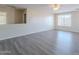 Large bonus room with wood-look flooring and plenty of natural light at 22320 W Morning Glory St, Buckeye, AZ 85326