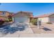 Charming single-Gathering home with a two-car garage and low-maintenance desert landscaping, in a residential neighborhood at 22320 W Morning Glory St, Buckeye, AZ 85326