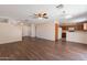 View of the living room shows an open floor plan that leads to the kitchen at 22320 W Morning Glory St, Buckeye, AZ 85326
