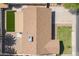 Aerial view of the house featuring a well-maintained roof, artificial turf and clean hardscape at 2329 S Elm --, Mesa, AZ 85202