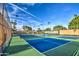 Well-lit tennis courts with high-quality surfaces and ample space for recreational activities at 2329 S Elm --, Mesa, AZ 85202