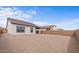 Spacious backyard with modern home exterior and ample space, ideal for outdoor living and activities at 23385 W Burton Ave, Buckeye, AZ 85326