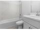 Clean bathroom with tub and shower and modern sink at 23456 W Fulton St, Buckeye, AZ 85326
