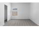 Empty bedroom with closet and natural light at 23456 W Fulton St, Buckeye, AZ 85326