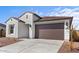 This cozy single-Gathering house has a tile roof, low-maintenance landscaping, and a two-car garage at 23456 W Fulton St, Buckeye, AZ 85326