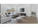 Inviting living room features stylish furniture, modern decor, and ample natural light at 23456 W Fulton St, Buckeye, AZ 85326