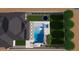 Overhead view of the property with a sparkling pool, spa, manicured lawn, and spacious outdoor area at 26619 S 169Th Pl, Queen Creek, AZ 85142