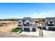 Stunning aerial view of a new build with large yards and three car garages at 26619 S 169Th Pl, Queen Creek, AZ 85142