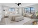 Bright main bedroom with large windows and comfortable seating area at 26619 S 169Th Pl, Queen Creek, AZ 85142