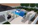 Aerial view of a backyard with a gorgeous pool, spa, lounge chairs, and lush landscaping at 26619 S 169Th Pl, Queen Creek, AZ 85142