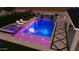 Experience the ultimate backyard with a dazzling pool, luxurious spa, and ambient lighting for nighttime enjoyment at 26619 S 169Th Pl, Queen Creek, AZ 85142