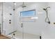 Modern shower with glass door, overhead shower head, and bench seating at 26619 S 169Th Pl, Queen Creek, AZ 85142
