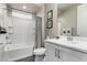 Bathroom featuring a shower/tub and white vanity at 27021 W Kerry Ln, Buckeye, AZ 85396
