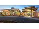 A community center with modern architecture, stone accents, and well-maintained landscaping at 27021 W Kerry Ln, Buckeye, AZ 85396