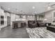 Open-concept living space with kitchen, dining, and living areas at 27021 W Kerry Ln, Buckeye, AZ 85396
