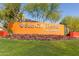Sun City Festival sign surrounded by colorful flowers and greenery at 27021 W Kerry Ln, Buckeye, AZ 85396