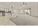 Spacious open floor plan with kitchen, dining area and living room and natural light at 300 W Windsor Dr, Gilbert, AZ 85233