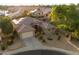 Bird's eye view of a landscaped home with solar panels and a three-car garage at 3350 S Holguin Way, Chandler, AZ 85248
