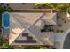 Overhead of landscaped property with pool, patio, solar panels and fountain at 3350 S Holguin Way, Chandler, AZ 85248