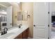 Bathroom showcasing double sinks, a large mirror, and a neutral color scheme at 3350 S Holguin Way, Chandler, AZ 85248