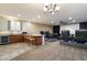 Home theater complete with reclining chairs, mini bar, wine storage, and tiered seating at 3350 S Holguin Way, Chandler, AZ 85248