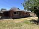 A brick home with a large yard and covered carport at 3538 W Sierra Vista Dr, Phoenix, AZ 85019
