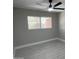 A calming bedroom with a ceiling fan and light grey vinyl flooring at 3538 W Sierra Vista Dr, Phoenix, AZ 85019