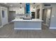Bright kitchen featuring stainless steel appliances, a range hood, and white cabinetry at 3538 W Sierra Vista Dr, Phoenix, AZ 85019