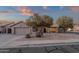 Charming single-story home featuring desert landscaping, a two-car garage, and a cozy front patio at 3842 W Ironwood Dr, Chandler, AZ 85226