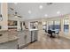 Bright kitchen area with stainless steel dishwasher, granite countertops, and an adjacent breakfast nook at 3842 W Ironwood Dr, Chandler, AZ 85226