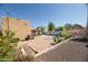 Expansive backyard with brick patio and desert landscaping, perfect for outdoor entertaining at 39 E Hoover Ave, Phoenix, AZ 85004
