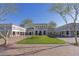 Historic building with manicured lawn, elegant facade, and lush landscaping, inviting visitors to explore its exhibits at 39 E Hoover Ave, Phoenix, AZ 85004