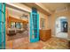 Open-concept floor plan with a living room featuring sliding doors to the patio and colorful decor at 39 E Hoover Ave, Phoenix, AZ 85004