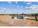 Aerial view of a new home showcasing desert landscaping and a circular driveway at 3989 E Freeman Ln, San Tan Valley, AZ 85140