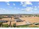 Aerial shot highlighting new construction in a residential area, with houses on large lots and mountain views at 3989 E Freeman Ln, San Tan Valley, AZ 85140