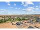 Bird's eye perspective showcases a vibrant community nestled within a vast landscape, perfect for a peaceful and spacious lifestyle at 3989 E Freeman Ln, San Tan Valley, AZ 85140