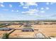 Elevated view of a community featuring new homes on generous lots, many still undergoing landscaping at 3989 E Freeman Ln, San Tan Valley, AZ 85140