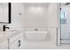 Modern bathroom highlighting a freestanding tub, sleek fixtures, and bright white finishes at 3989 E Freeman Ln, San Tan Valley, AZ 85140