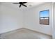 Minimalist bedroom with neutral carpet and a window providing ample natural light at 3989 E Freeman Ln, San Tan Valley, AZ 85140