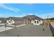 Charming single-story home with a well-manicured yard, a gray tile roof and a stone entryway at 3989 E Freeman Ln, San Tan Valley, AZ 85140