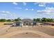 Beautiful front exterior featuring a circular driveway and manicured gravel landscaping at 3989 E Freeman Ln, San Tan Valley, AZ 85140