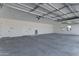 Spacious garage with high ceilings and concrete floors at 3989 E Freeman Ln, San Tan Valley, AZ 85140