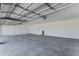 Spacious garage with high ceilings and concrete floors at 3989 E Freeman Ln, San Tan Valley, AZ 85140