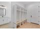 Convenient mud room with built-in storage, bench seating, and ample space for organization near the entry at 3989 E Freeman Ln, San Tan Valley, AZ 85140