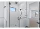 Modern shower with glass enclosure, black trim, and stylish tile at 3989 E Freeman Ln, San Tan Valley, AZ 85140