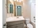 Bathroom featuring a vanity sink and toilet at 4323 E Wheaton St, Gilbert, AZ 85295